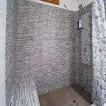 Maisonette Korfes-δύο αυτόνομοι όροφοι πέτρινης βίλας